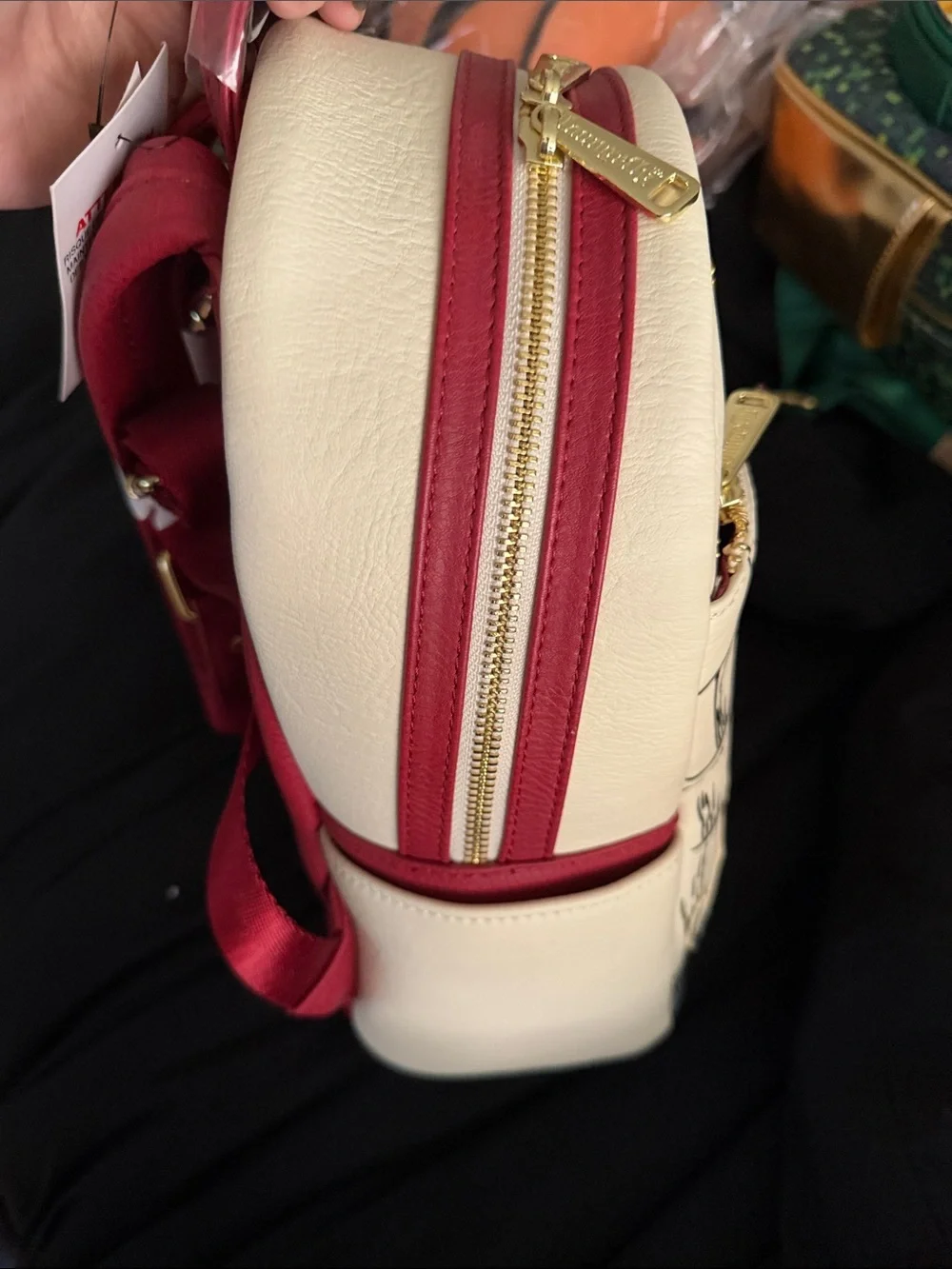 Loungefly White Pirates of the Caribbean Backpack with Red Accents